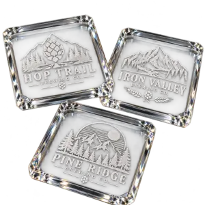 Brewery crystal coasters with custom brewery logo samples on a transparent background